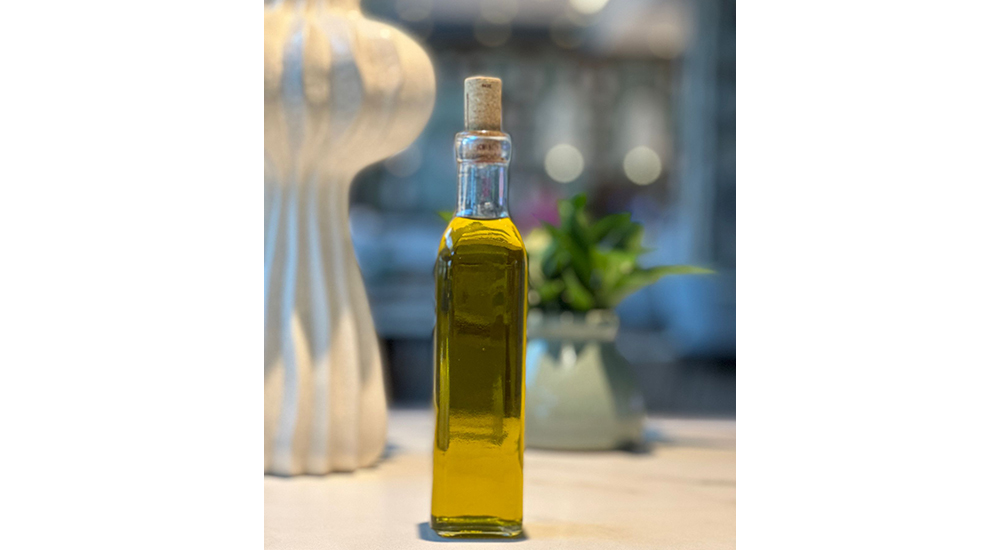 Botella de aceite solidario