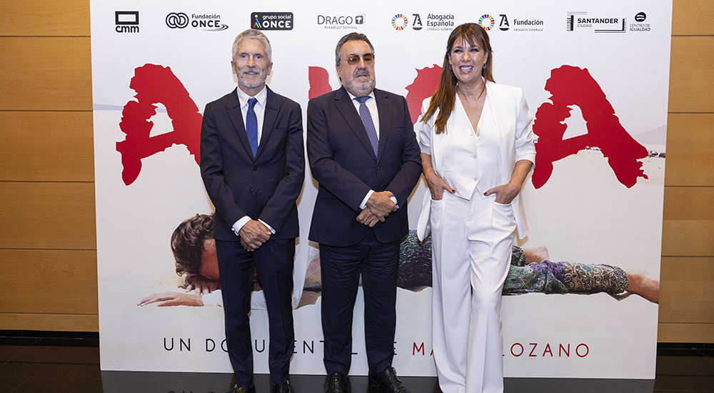 Grande-Marlaska, Miguel Carballeda y Mabel Lozano en la presentación