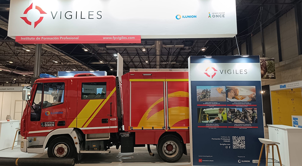 Stand de Vigiles en Aula